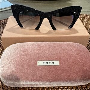 Miu Miu Black Glitter Cat-Eye Sunglasses with Pink Case